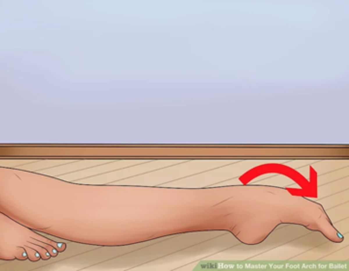stretch your arches by pointing your toes to improve foot and arch flexibility